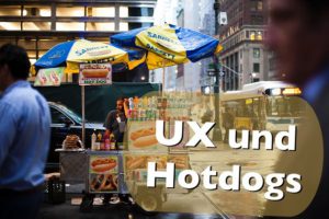 Ein Hotdog Stand auf einer Straße. Davor steht der Titel "UX und Hotdogs"